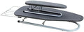 Une planche de table comporte un support pour le fer