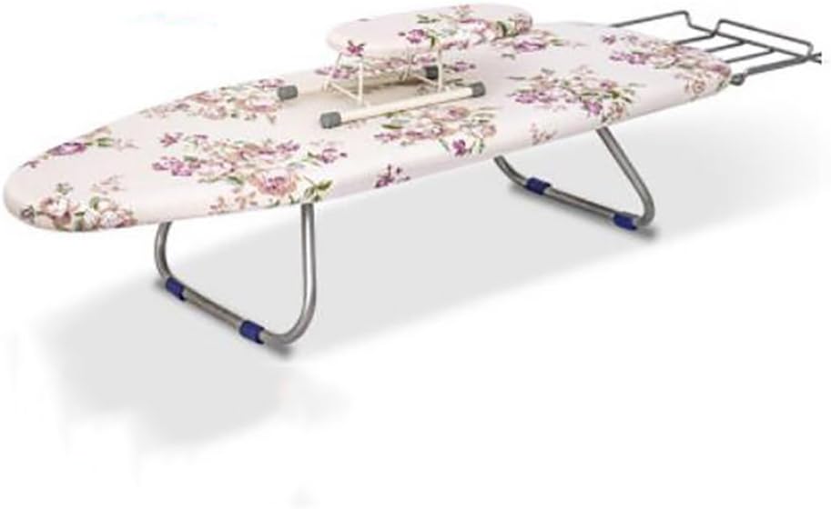 La planche de table associe une surface laissant passer la vapeur et une structure pliante